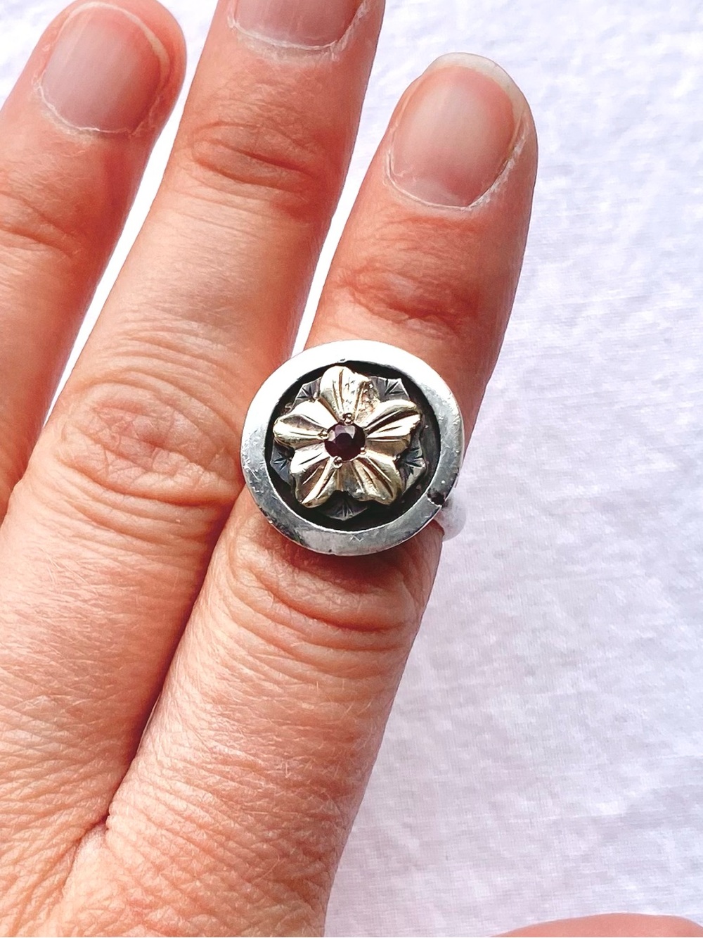 Fabulous round silver and gold tone flower ring with Red stone size 3.25